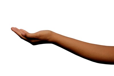 Thinkstock/Comstock/Getty Images Flex your wrist to stretch your forearm muscles.
