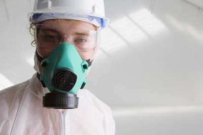 Jupiterimages/Comstock/Getty Images Respiratory, face and skin protection may be needed in response to ammonia spills.