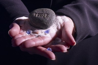 Hemera Technologies/AbleStock.com/Getty Images Dealing with clients honestly creates trust in the workplace.