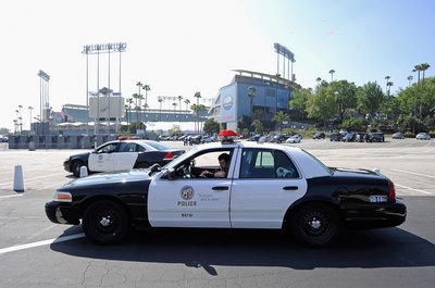 Kevork Djansezian/Getty Images News/Getty Images LAPD officers patrol neighborhoods and respond to crime calls.