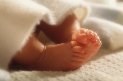 Jupiterimages/Photos.com/Getty Images Having a baby can lead to major tax breaks.