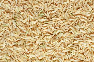 Ryan McVay/Digital Vision/Getty Images Brown rice packs plenty of fiber into your diet.