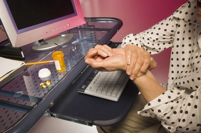 Creatas Images/Creatas/Getty Images Letting prospective employers know that your gout is manageable can improve your chances of securing a job.