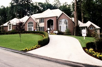 Jupiterimages/Photos.com/Getty Images An HOA has many duties, including ensuring your neighborhood is somewhere you're proud to call home.