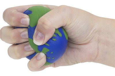 Hemera Technologies/PhotoObjects.net/Getty Images With exercise, you can strengthen your hands, no matter their size.