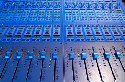 Jupiterimages/Photos.com/Getty Images A sound engineer must understand audio equipment.