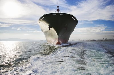 Stephen Schauer/Lifesize/Getty Images Ships of all sizes around the world must be commanded by a captain.