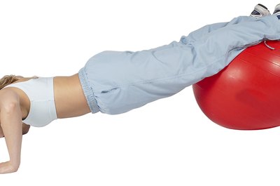 Hemera Technologies/PhotoObjects.net/Getty Images Decline push-ups can keep your upper body in great shape without even visiting the gym.