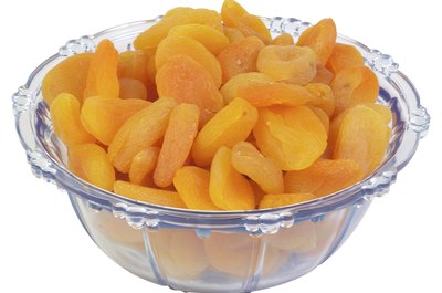 Hemera Technologies/PhotoObjects.net/Getty Images Dried fruits are high in fiber.
