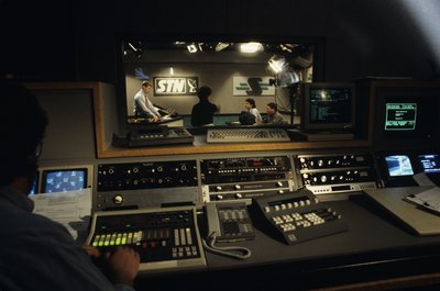 Kim Steele/Photodisc/Getty Images A TV scenic design supervisor must balance lighting with the placement of props and actors.