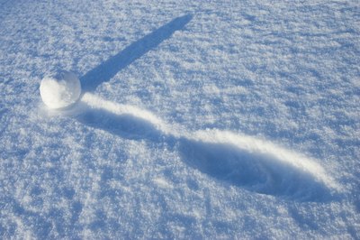 Jupiterimages/Comstock/Getty Images "Snowballing" your debt payments can help you pay off your debt faster.