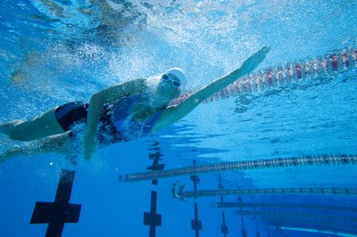 Polka Dot Images/Polka Dot/Getty Images Breathe out continually -- your body wants to expel all that CO2.