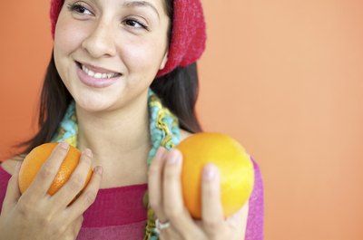 Creatas Images/Creatas/Getty Images Hesperidin in citrus fruits might improve tooth remineralization.