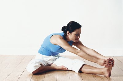 Polka Dot Images/Polka Dot/Getty Images Strengthen and stretch legs with an at-home leg workout.