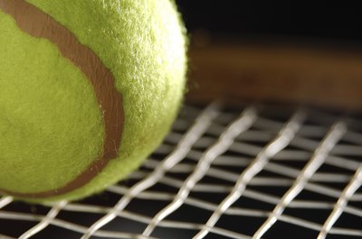 Hemera Technologies/AbleStock.com/Getty Images Tennis requires speed, strength and agility.