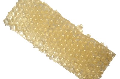 Jupiterimages/Comstock/Getty Images Raw honey comes directly from honeycomb.