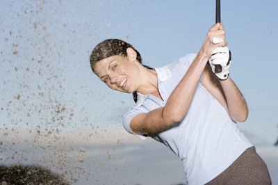Pixland/Pixland/Getty Images Strengthening your hip adductor and abductors will improve your golf swing.