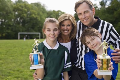 Jupiterimages/Comstock/Getty Images If you want a great award ceremony, budget carefully.