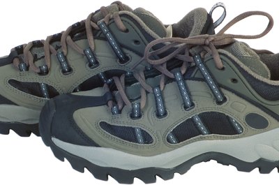Hemera Technologies/PhotoObjects.net/Getty Images Extra string holes in sneakers are about function, not fashion.