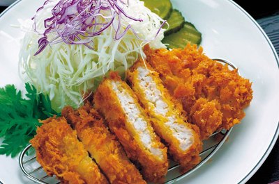 Photos.com/Photos.com/Getty Images Fried foods, certain veggies, white bread and salt can cause or worsen bloating.