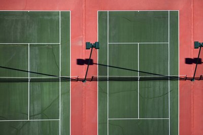 Jupiterimages/Comstock/Getty Images Sprint exercises on the court help players to become fast and explosive during match play.
