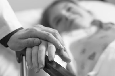 Hemera Technologies/AbleStock.com/Getty Images Pediatric oncologists work in hospitals, at research centers and in academia.