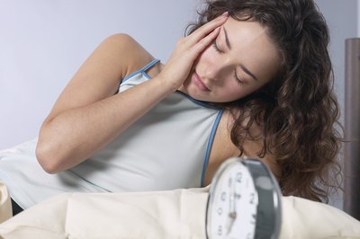 Hemera Technologies/AbleStock.com/Getty Images Eating too much protein can cause nausea and diarrhea.