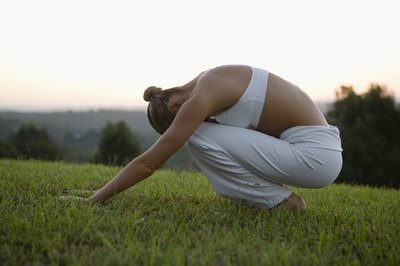 Jupiterimages/BananaStock/Getty Images Do gentle stretches for your back that won't aggravate your sore tailbone.