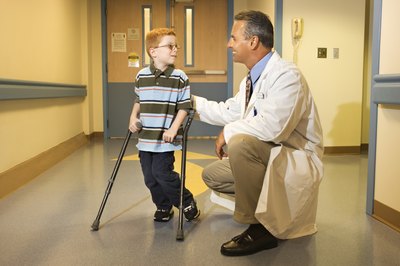 Jupiterimages/Comstock/Getty Images Families with disabled children can find financial help from a number of public and private groups.