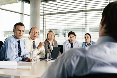 Digital Vision./Digital Vision/Getty Images Advisory and executive boards look very much the same.