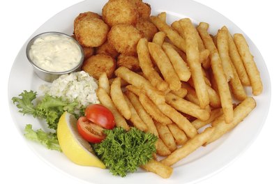 Hemera Technologies/PhotoObjects.net/Getty Images Breading and frying is the least healthy way to cook scallops.