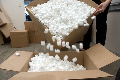 Jupiterimages/Photos.com/Getty Images Keep your cat away from Styrofoam packing peanuts to avoid intestinal blockages and other ill effects.
