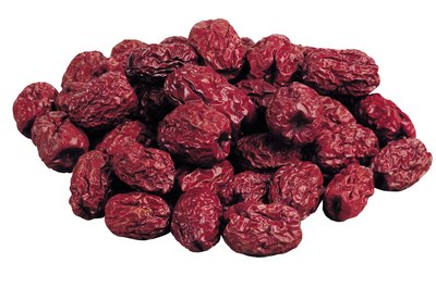 Jupiterimages/Photos.com/Getty Images Dried cranberries are higher in fiber, but lower in most nutrients, than cranberry juice.