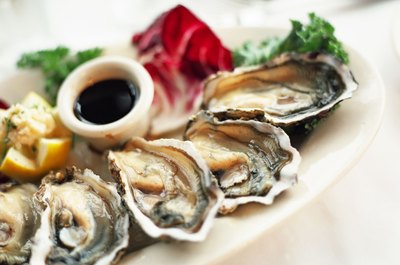 Jupiterimages/Photos.com/Getty Images Oysters have the highest dietary zinc content.