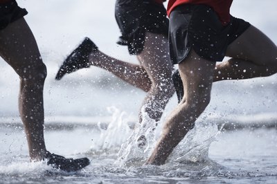 Ryan McVay/Digital Vision/Getty Images Runners depend on strong foot muscles for optimal performance.
