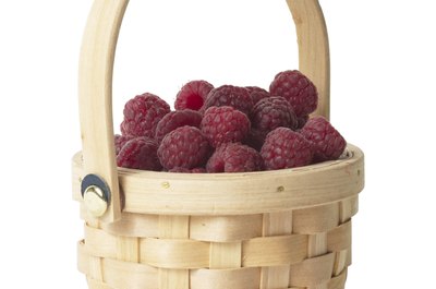 PhotoObjects.net/PhotoObjects.net/Getty Images Raspberries contain compounds that may help fight cancer.