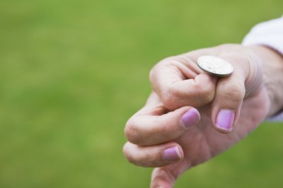 Jupiterimages/BananaStock/Getty Images Pretax and after-tax payment of insurance premiums each could mean more money in your pocket.