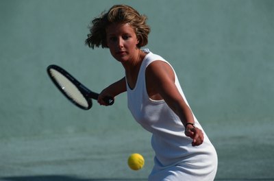 David De Lossy/Photodisc/Getty Images Learning to play tennis is easier with an Eastern grip.