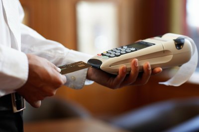 Rayes/Photodisc/Getty Images Your receipt may reflect a credit card surcharge.
