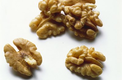 Eising/Photodisc/Getty Images Walnuts can make your diet healthier.