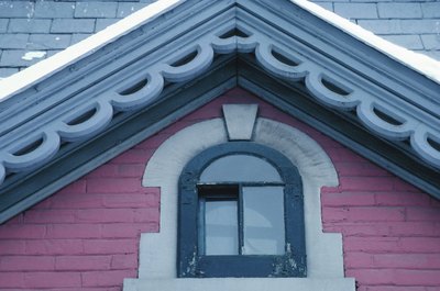 Hemera Technologies/Photos.com/Getty Images You might have to get rid of your HOA if you want a pink house.
