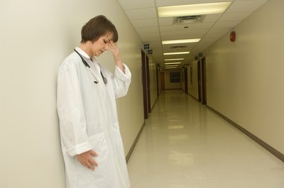 Jupiterimages/Photos.com/Getty Images A medical student who confronts an ethical issue may be reluctant to speak up.