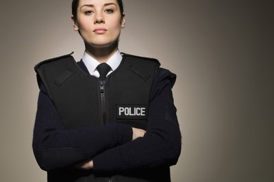 Jupiterimages/Polka Dot/Getty Images Off-duty police officers can often find part-time work as nightclub bouncers.