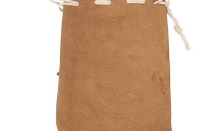 Hemera Technologies/PhotoObjects.net/Getty Images Make a simple drawstring bag to carry dog treats.