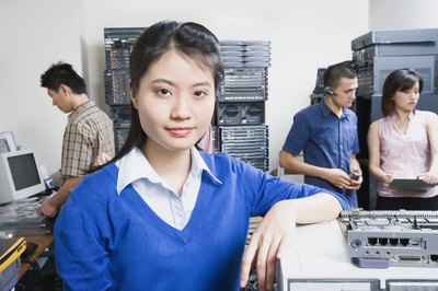 Thinkstock Images/Comstock/Getty Images System administrators manage a company's computer servers.