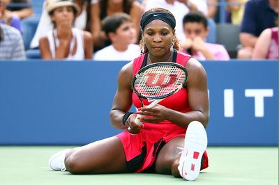 Julian Finney/Getty Images Sport/Getty Images Serena Williams plays with a heavy 11-ounce racket.