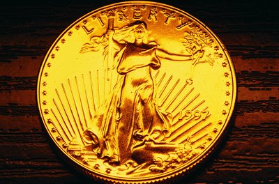 Stockbyte/Stockbyte/Getty Images You can put gold coins minted by the U.S. Treasury into your IRA.