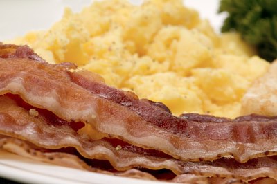 Jupiterimages/liquidlibrary/Getty Images Diets high in fat and cholesterol contribute to elevated LDL levels.