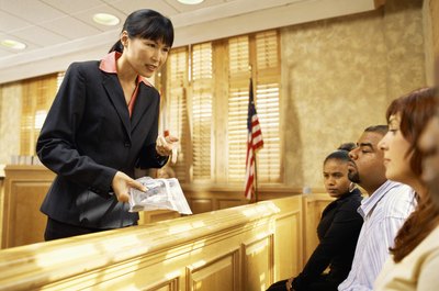 Stockbyte/Stockbyte/Getty Images Many courts see jury duty as an important civic duty.