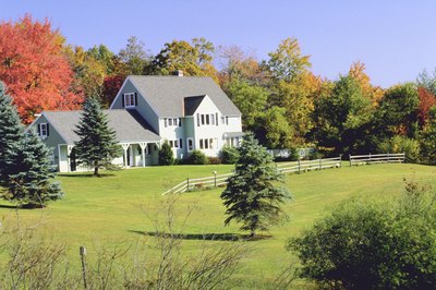 NA/AbleStock.com/Getty Images Rural homes commonly have septic systems rather than sewer connections.